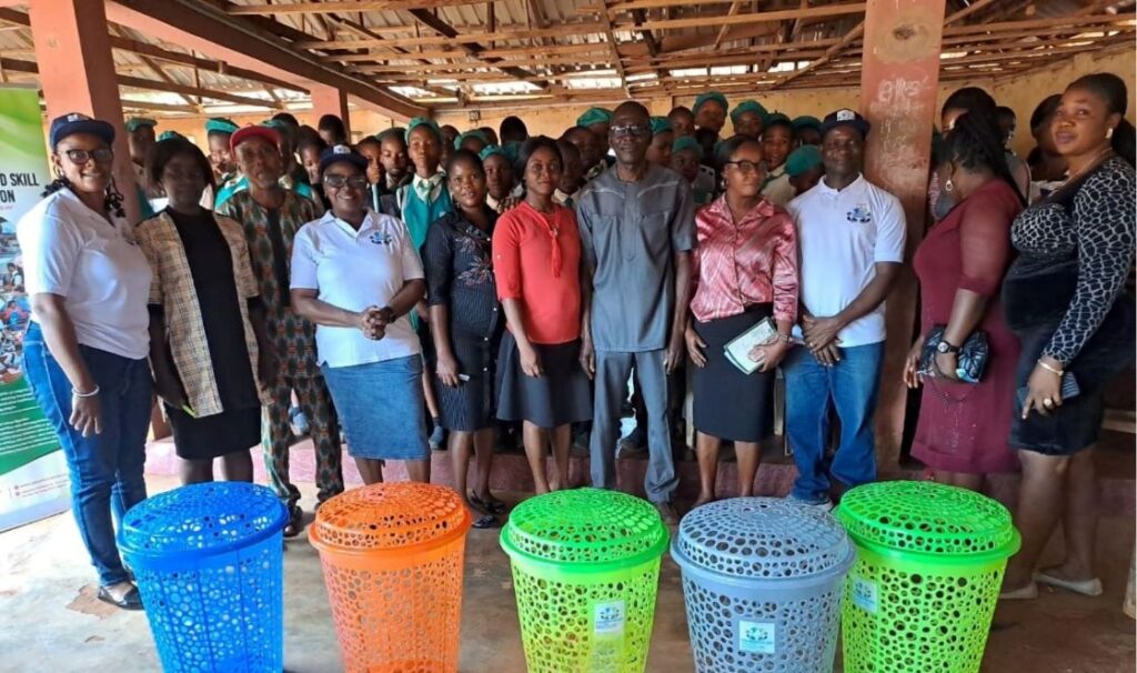 YDASSF Donating Waste Disposal Bins to the School